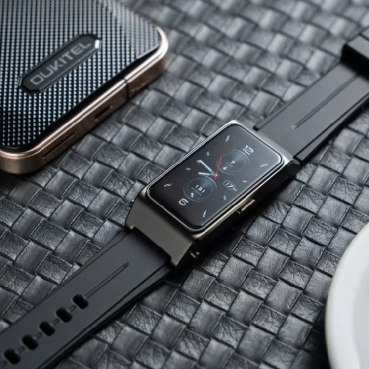 Smartwatch with a black band on a textured surface